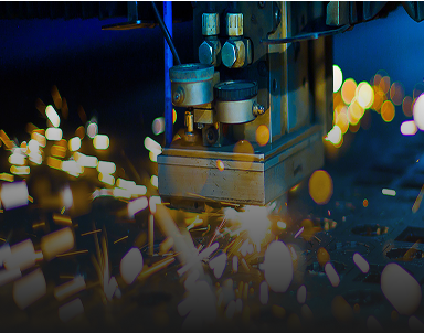 Sparks flying around manufacturing equipment. 